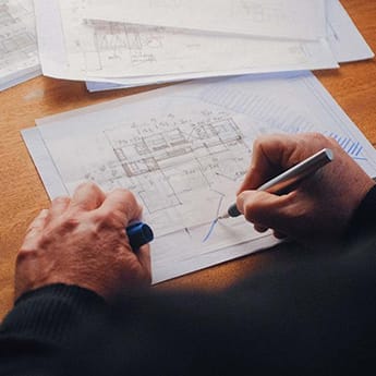 Hand-drawn engineering sketch of a customized feed mill plant layout for optimal production flow